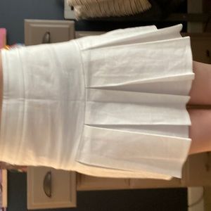 White pleated skirt